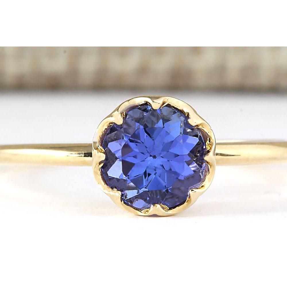 1.35 CTW Natural Tanzanite Ring In 18K Yellow Gold: 1.35 CTW Natural Tanzanite Ring In 18K Yellow Gold Manufacturer's Suggested Retail Price: $ 1800.00 Stamped: 18K Ring Size: 7.00 Total Ring Weight: 1.7 Grams Gemstone Weight: Total Natural Tanzanite W