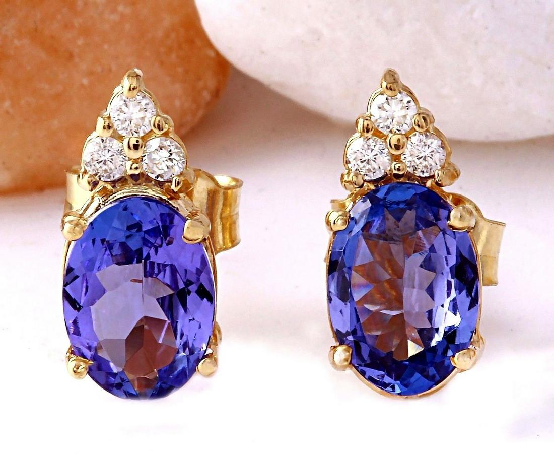 1.65 CTW Natural Tanzanite 18K Solid Yellow Gold: 1.65 CTW Natural Tanzanite 18K Solid Yellow Gold Diamond Stud Earrings Manufacturer's Suggested Retail Price: $ 1500.00 1.65 Carat Natural Tanzanite 18K Solid Yellow Gold Diamond Stud Earrings Item Ty