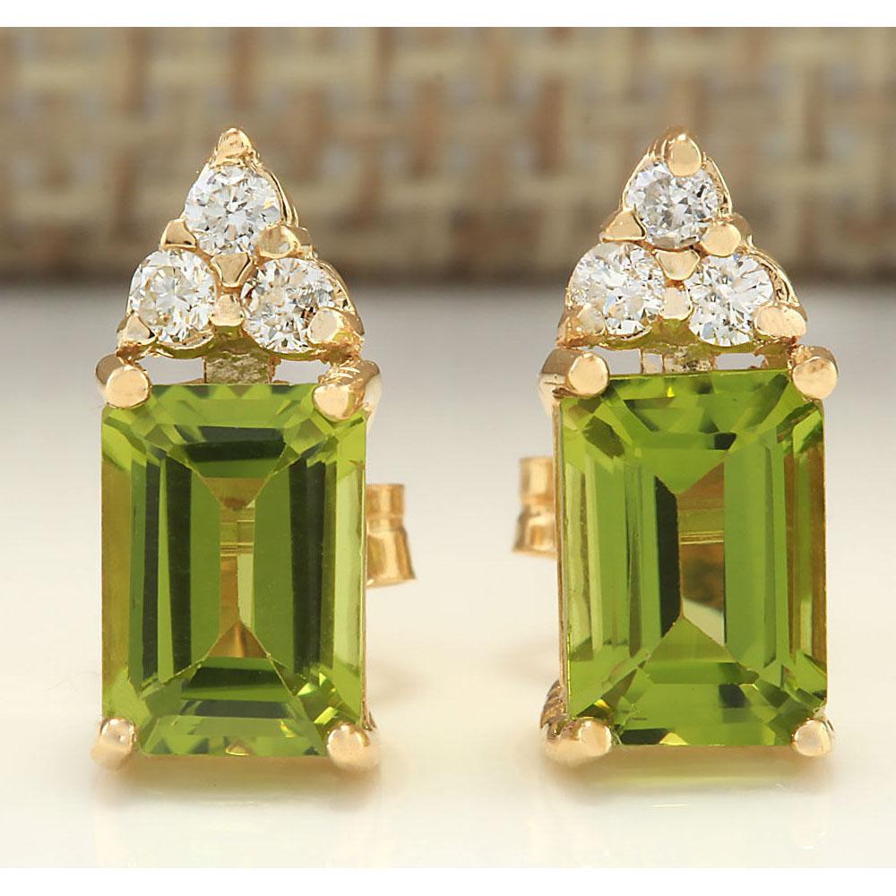 2.75 CTW Natural Peridot And Diamond Earrings 18K Solid: 2.75 CTW Natural Peridot And Diamond Earrings 18K Solid Yellow Gold Manufacturer's Suggested Retail Price: $ 1800.00 Stamped: 18K Total Earring Weight: 1.2Grams Diamond Weight: Total Natural diamond w