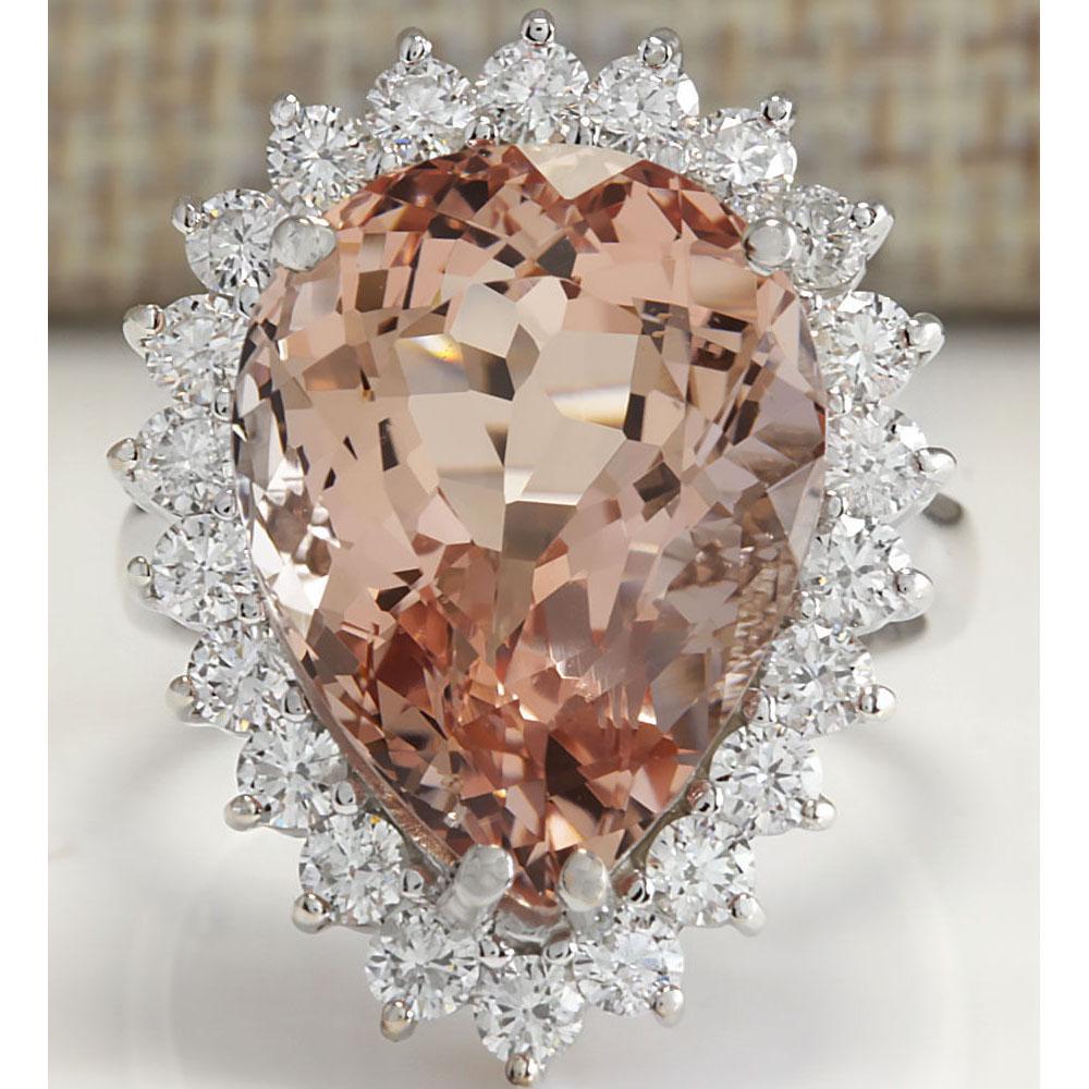 13.43 CTW Natural Peach Morganite And Diamond Ring In: 13.43 CTW Natural Peach Morganite And Diamond Ring In 18K Solid White Gold Manufacturer's Suggested Retail Price: $ 9250.00 Stamped: 18K Ring Size: 6.75 Total Ring Weight: 7Grams Diamond Weight: Total