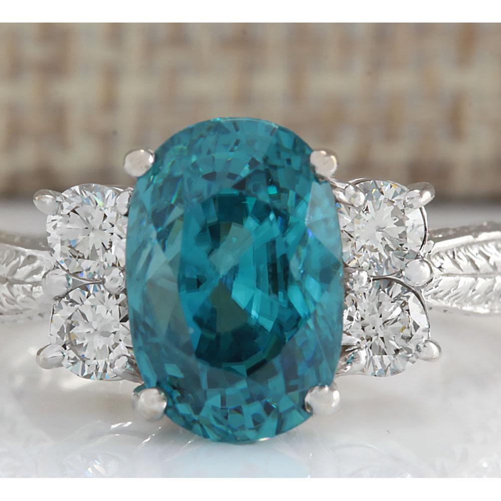 7.07 CTW Natural Blue Zircon And Diamond Ring 14K Solid: 7.07 CTW Natural Blue Zircon And Diamond Ring 14K Solid White Gold Manufacturer's Suggested Retail Price: $ 7400.00 Stamped: 14K Ring Size: 7 Total Ring Weight: 6.2 Grams Diamond Weight: Total Natural