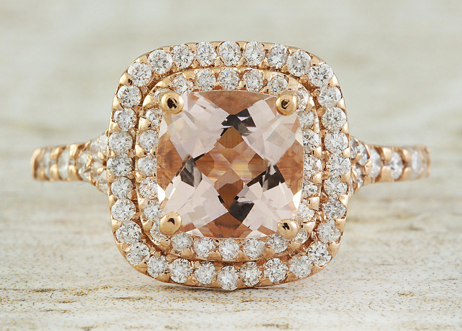2.25 CTW Morganite 14K Rose Gold Diamond Ring: 2.25 CTW Morganite 14K Rose Gold Diamond Ring Manufacturer's Suggested Retail Price: $ 3600.00 Stamped: 14K Ring Size: 7 Total Ring Weight: 3.3 Grams Morganite Weight: 1.45 Carat (7.20x7.20 Millimeter