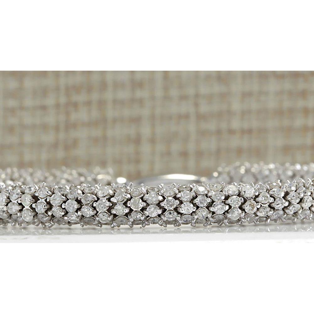 14.00 CTW Natural Diamond Bracelet In 14K Solid White: 14.00 CTW Natural Diamond Bracelet In 14K Solid White Gold Manufacturer's Suggested Retail Price: $ 38600.00 Stamped: 14K Bracelet Width: 6.00mm Total Bracelet Weight: 25 Grams Diamond Weight: Total N