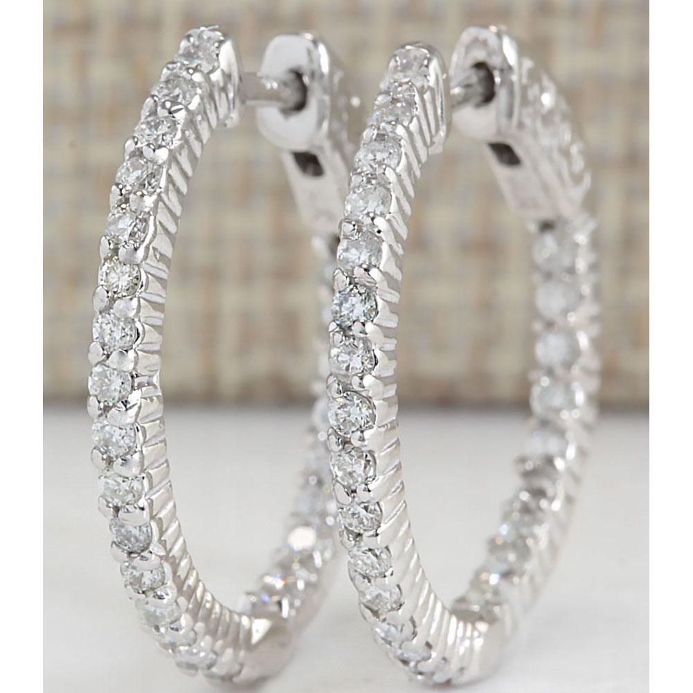 1.26 CTW Natural Diamond Hoop Earrings In 18K White: 1.26 CTW Natural Diamond Hoop Earrings In 18K White Gold Manufacturer's Suggested Retail Price: $ 5650.00 Stamped: 18K Total Earrings Weight: 5.3 Grams Diamond Weight: Total Natural diamond weight is 