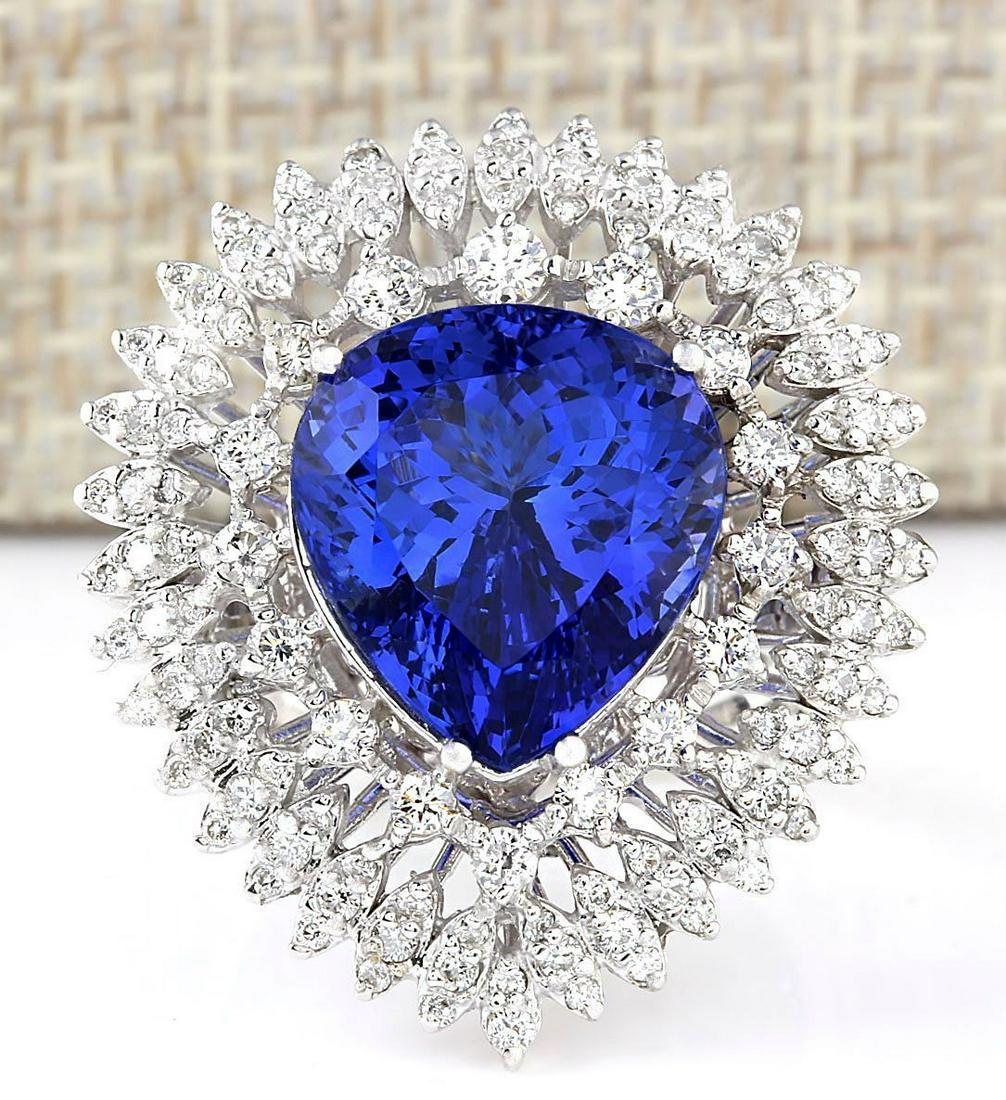 12.23 CTW Natural Blue Tanzanite And Diamond Ring 14k: 12.23 CTW Natural Blue Tanzanite And Diamond Ring 14k Solid White Gold Manufacturer's Suggested Retail Price: $ 15650.00 Stamped: 14K Ring Size: 7 Total Ring Weight: 11 Grams Diamond Weight: Total Nat
