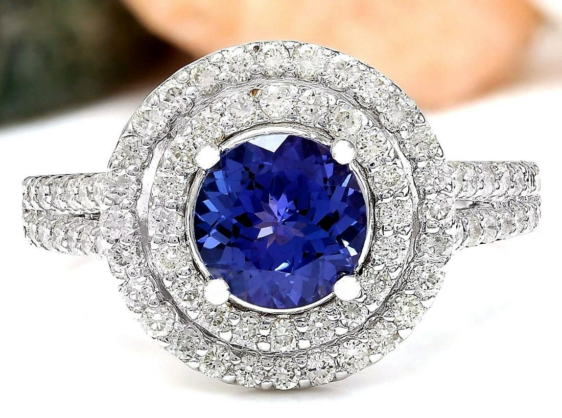 2.55 CTW Natural Tanzanite 14K Solid White Gold Diamond: 2.55 CTW Natural Tanzanite 14K Solid White Gold Diamond Ring Manufacturer's Suggested Retail Price: $ 4200.00 2.55 Carat Natural Tanzanite 14K Solid White Gold Diamond Ring Item Type: Ring Item Style: