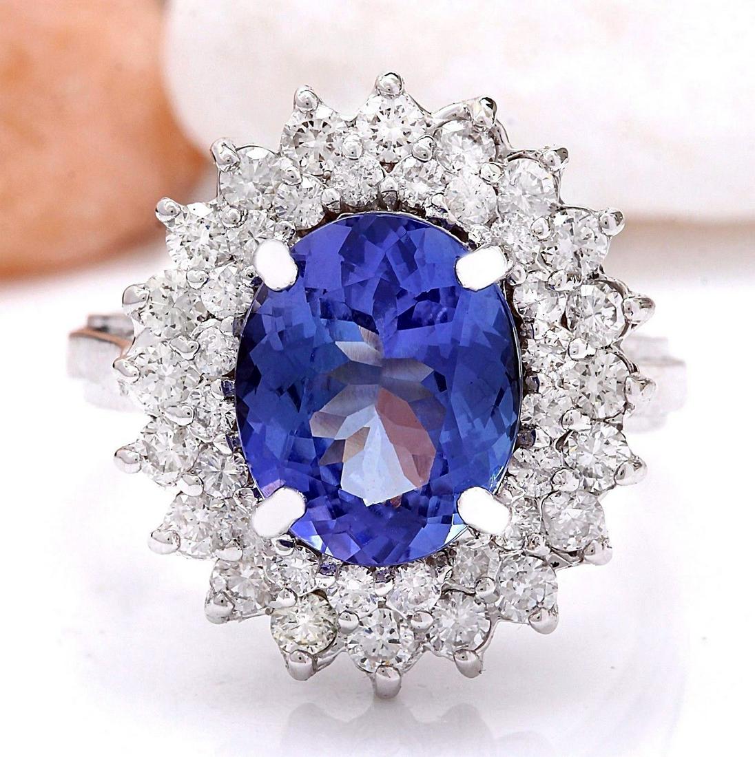 4.72 CTW Natural Tanzanite 18K Solid White Gold Diamond: 4.72 CTW Natural Tanzanite 18K Solid White Gold Diamond Ring Manufacturer's Suggested Retail Price: $ 5400.00 4.72 Carat Natural Tanzanite 18K Solid White Gold Diamond Ring Item Type: Ring Item Style: