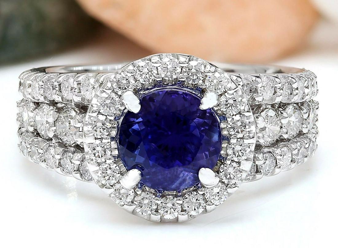 3.99 CTW Natural Tanzanite 14K Solid White Gold Diamond: 3.99 CTW Natural Tanzanite 14K Solid White Gold Diamond Ring Manufacturer's Suggested Retail Price: $ 5400.00 3.99 Carat Natural Tanzanite 14K Solid White Gold Diamond Ring Item Type: Ring Item Style: