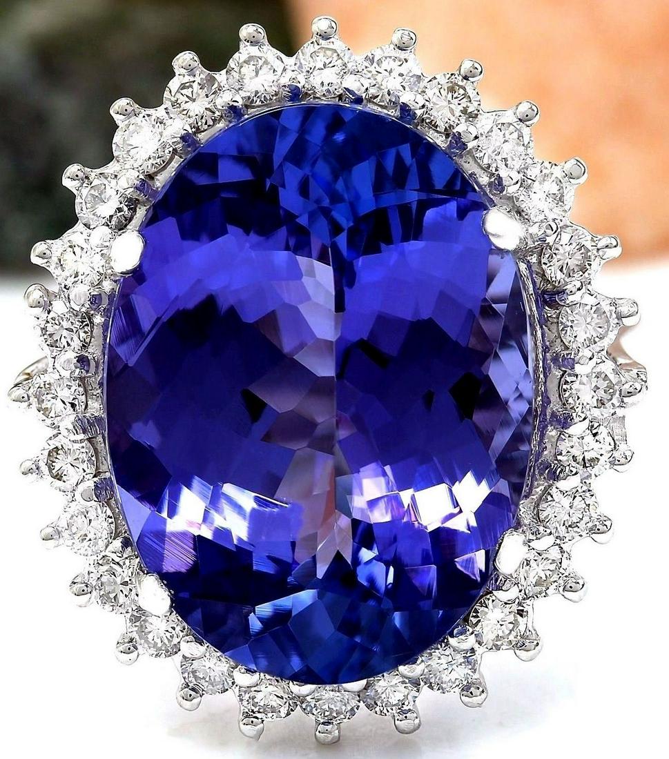 14.25 CTW Natural Tanzanite 14K Solid White Gold: 14.25 CTW Natural Tanzanite 14K Solid White Gold Diamond Ring Manufacturer's Suggested Retail Price: $ 10400.00 14.25 Carat Natural Tanzanite 14K Solid White Gold Diamond Ring Item Type: Ring Item Sty