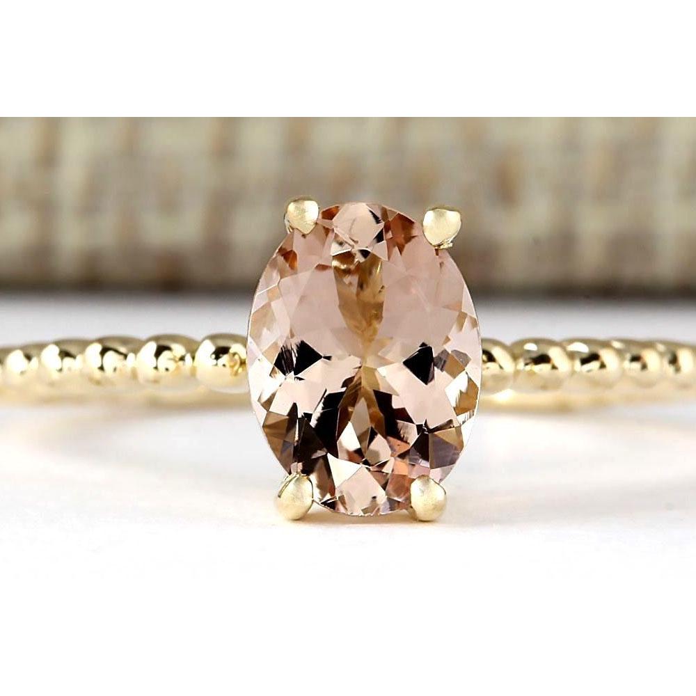 1.10 CTW Natural Morganite Ring In 18K Yellow Gold: 1.10 CTW Natural Morganite Ring In 18K Yellow Gold Manufacturer's Suggested Retail Price: $ 1100.00 Stamped: 18K Ring Size: 6.75 Total Ring Weight: 1.8 Grams Gemstone Weight: Total Natural Morganite W