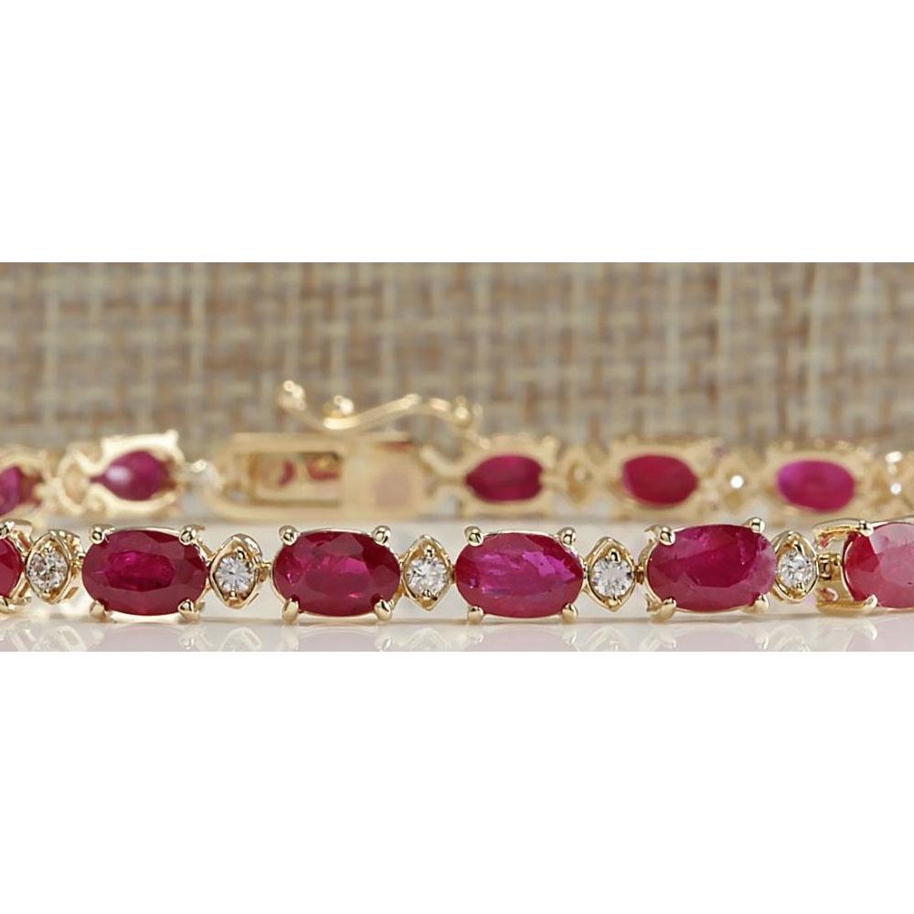 14.26CTW Natural Red Ruby And Diamond Bracelet In 14K: 14.26CTW Natural Red Ruby And Diamond Bracelet In 14K Yellow Gold Manufacturer's Suggested Retail Price: $ 4600.00 Stamped: 14K Bracelet Width: 4.09mm Bracelet Length: 7.0 Inches Total Bracelet Weight