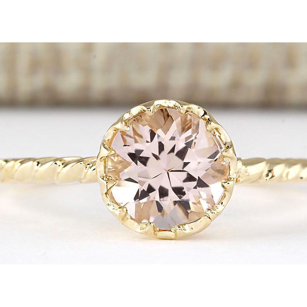 1.20 CTW Natural Morganite Ring In 14k Yellow Gold: 1.20 CTW Natural Morganite Ring In 14k Yellow Gold Manufacturer's Suggested Retail Price: $ 1200.00 Stamped: 14K Ring Size: 6.75 Total Ring Weight: 1 Grams Gemstone Weight: Total Natural Morganite Wei