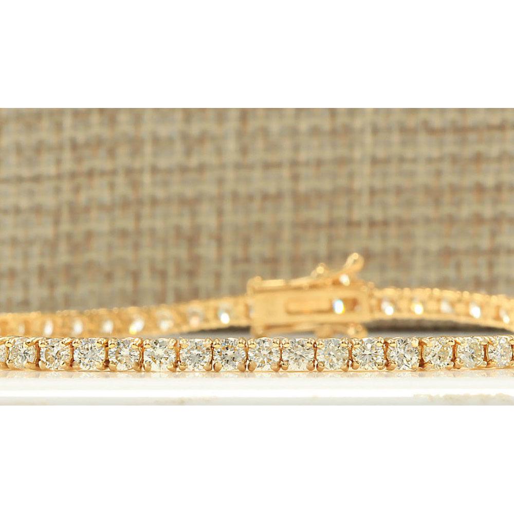 4.68 CTW Natural Diamond Bracelet In 18K Yellow Gold: 4.68 CTW Natural Diamond Bracelet In 18K Yellow Gold Manufacturer's Suggested Retail Price: $ 9800.00 Stamped: 18K Bracelet Width: 2.75mm Bracelet Length: 7.0 Inches Total Bracelet Weight: 8.6 Grams D