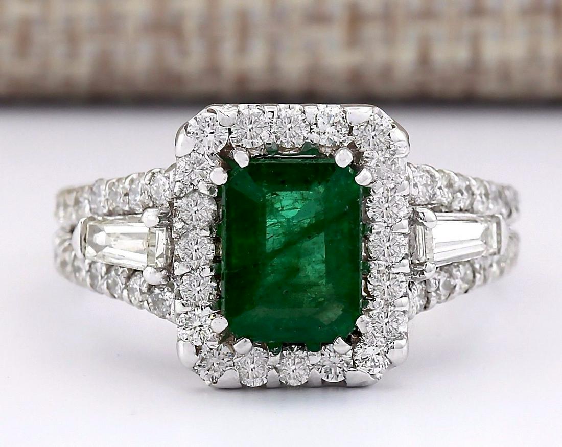 3.30 CTW Natural Emerald And Diamond Ring In 18K White: 3.30 CTW Natural Emerald And Diamond Ring In 18K White Gold Manufacturer's Suggested Retail Price: $ 5300.00 Stamped: 18K Ring Size: 6.25 Total Ring Weight: 7.5 Grams Diamond Weight: Total Natural dia