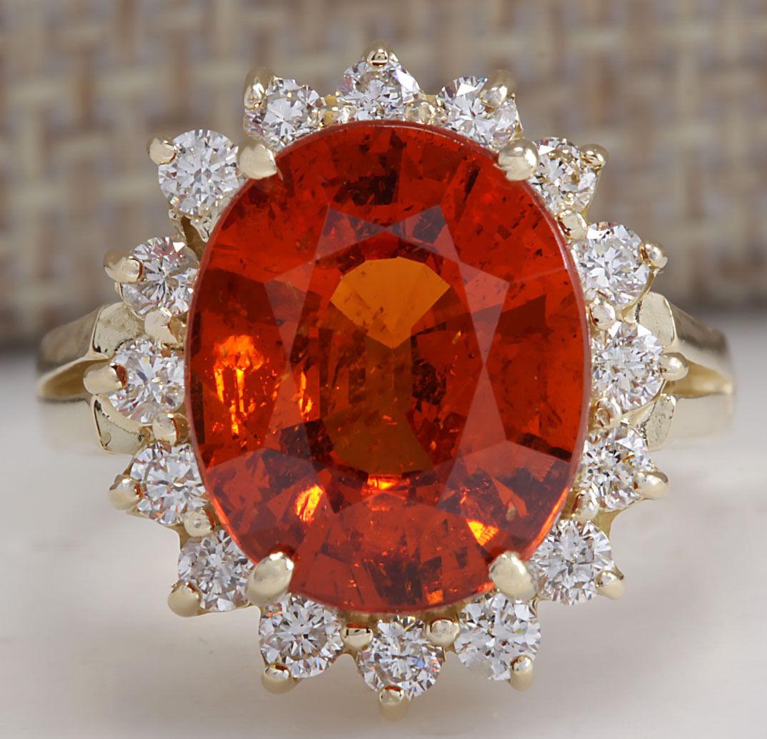 6.96CTW Natural Mandarin Garnet And Diamond Ring In18K: 6.96CTW Natural Mandarin Garnet And Diamond Ring In18K Yellow Gold Manufacturer's Suggested Retail Price: $ 6800.00 Stamped: 18K Ring Size: 5.25 Total Ring Weight: 6 Grams Diamond Weight: Total Natura