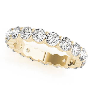 Natural 5.61 CTW Diamond Eternity Ring 14K Yellow Gold: Natural 5.61 CTW Diamond Eternity Ring 14K Yellow Gold Manufacturer's Suggested Retail Price: $ 27200.00 Product Type: Diamond Eternity Ring Stone1 Type: 17 Diamond @ 5.61 CTW Stone1 Color: G