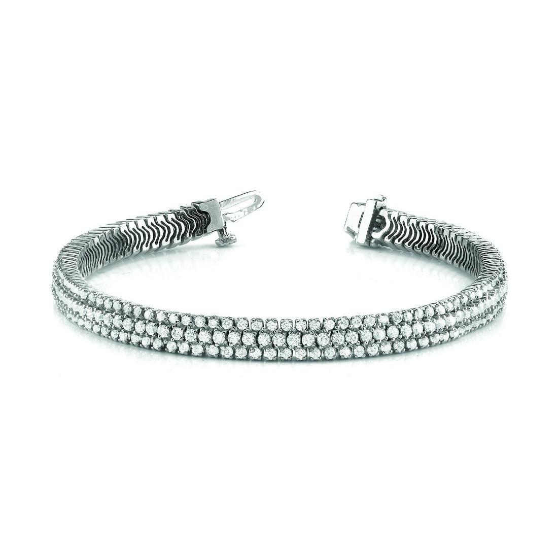 Natural 7.04 CTW Diamond Bracelet 18K White Gold: Natural 7.04 CTW Diamond Bracelet 18K White Gold Manufacturer's Suggested Retail Price: $17000.00 Product Type: Diamond Bracelet Stone1 Type: 207 Diamonds @ 7.04 CTW Stone1 Color: G Stone1 Clarity: VS