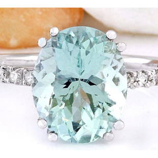 4.32 CTW Natural Aquamarine 14K Solid White Gold Diamond Ring: 4.32 CTW Natural Aquamarine 14K Solid White Gold Diamond Ring Manufacturer's Suggested Retail Price: $ 2500.00 4.32 Carat Natural Aquamarine 14K Solid White Gold Diamond Ring Item Type: Ring 