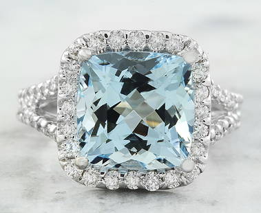 5.85 CTW Aquamarine 14K White Gold Diamond Ring: 5.85 CTW Aquamarine 14K White Gold Diamond Ring Manufacturer's Suggested Retail Price: $ 4100.00 Stamped: 14K Total Ring Weight: 7.3 Grams Aquamarine Weight 4.94 Carat (10.15x10.15