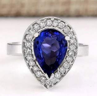 3.13 CTW Natural Blue Tanzanite And Diamond Ring 14k Solid White Gold: 3.13 CTW Natural Blue Tanzanite And Diamond Ring 14k Solid White Gold Manufacturer's Suggested Retail Price: $ 3800.00 Stamped: 14K Ring Size: 6.75 Total Ring Weight: 6.3 Grams Diamond
