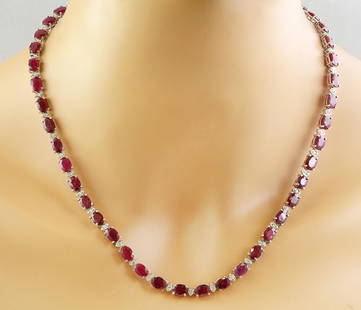 46.80 CTW Ruby 18K White Gold Diamond Necklace: 46.80 CTW Ruby 18K White Gold Diamond Necklace Manufacturer's Suggested Retail Price: $ 12600.00 Stamped: 18K Total Necklace Weight: 27.9 Grams Necklace Length: 18.5 Inches Ruby Weight: 45.00