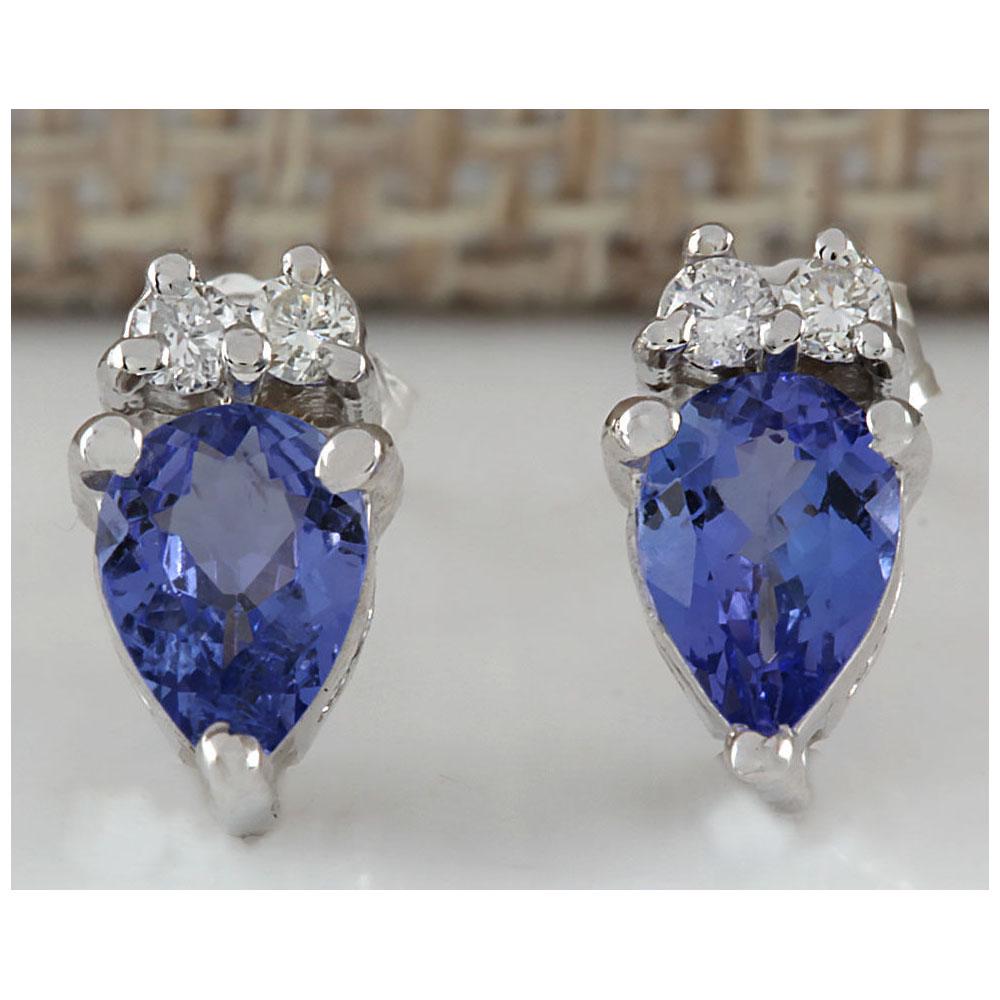 0.88 CTW Natural Blue Tanzanite And Diamond Earrings 14K Solid White Gold: 0.88 CTW Natural Blue Tanzanite And Diamond Earrings 14K Solid White Gold Manufacturer's Suggested Retail Price: $ 1100.00 Stamped: 14K Total Earring Weight: 1.8Grams Diamond Weight: Total Natural dia