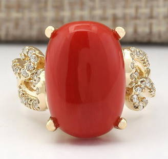 12.00 CTW Natural Coral And Diamond Ring In 18K Yellow Gold: 12.00 CTW Natural Coral And Diamond Ring In 18K Yellow Gold Manufacturer's Suggested Retail Price: $ 5400.00 Stamped: 18K Ring Size: 6.75 Total Ring Weight: 10.1 Grams Diamond Weight: 