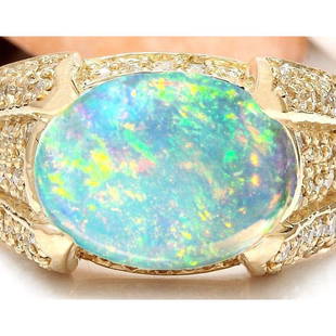 5.90 CTW Natural Opal 14K Solid Yellow Gold Diamond Ring: 5.90 CTW Natural Opal 14K Solid Yellow Gold Diamond Ring Manufacturer's Suggested Retail Price: $ 3700.00 5.90 Carat Natural Opal 14K Solid Yellow Gold Diamond Ring Item Type: Ring Item
