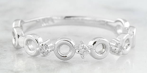 0.07 CTW Diamond 14K White Gold Ring: 0.07 CTW Diamond 14K White Gold Ring Manufacturer's Suggested Retail Price: $ 1100.00 Stamped: 14K Total Ring Weight: 1.7 Grams Diamond Weight: 0.07 carat (F-G Color, VS2-SI1 Clarity ) Face