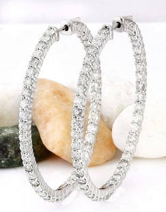3.56 CTW Natural Diamond 14K Solid White Gold Earrings: 3.56 CTW Natural Diamond 14K Solid White Gold Earrings Manufacturer's Suggested Retail Price: $ 7100.00 3.56 Carat Natural Diamond 14K Solid White Gold Earrings Item Type: Earrings Item