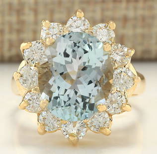 7.60 CTW Natural Aquamarine And Diamond Ring In 14K Yellow Gold: 7.60 CTW Natural Aquamarine And Diamond Ring In 14K Yellow Gold Manufacturer's Suggested Retail Price: $ 6200.00 Stamped: 14K Ring Size: 6.75 Total Ring Weight: 7.4 Grams Diamond Weight: 