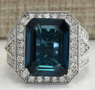 15.51CTW Natural London Blue Topaz And Diamond Ring In18K Solid White Gold: 15.51CTW Natural London Blue Topaz And Diamond Ring In18K Solid White Gold Manufacturer's Suggested Retail Price: $ 5700.00 Stamped: 18K Ring Size: 7 Total Ring Weight: 13 Grams Diamond