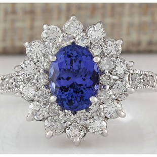 3.22 CTW Natural Tanzanite And Diamond Ring In 14K White Gold: 3.22 CTW Natural Tanzanite And Diamond Ring In 14K White Gold Manufacturer's Suggested Retail Price: $ 4900.00 Stamped: 14K Ring Size: 6.5 Total Ring Weight: 5 Grams Diamond Weight: Total