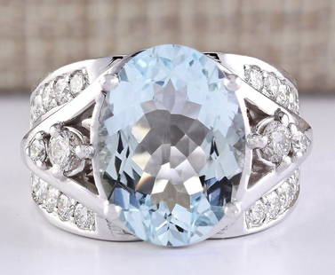 7.97 CTW Natural Aquamarine And Diamond Ring In 14k White Gold: 7.97 CTW Natural Aquamarine And Diamond Ring In 14k White Gold Manufacturer's Suggested Retail Price: $ 7500.00 Stamped: 14K Ring Size: 6.75 Total Ring Weight: 10.4 Grams Diamond Weight: 