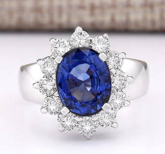 5.48 CTW Natural Ceylon Sapphire And Diamond Ring In 18K White Gold: 5.48 CTW Natural Ceylon Sapphire And Diamond Ring In 18K White Gold Manufacturer's Suggested Retail Price: $ 15200.00 Stamped: 18K Ring Size: 6.5 Total Ring Weight: 9.1 Grams Diamond Weight: