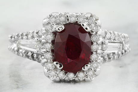 2.38 CTW Ruby 14K White Gold Diamond Ring: 2.38 CTW Ruby 14K White Gold Diamond Ring Manufacturer's Suggested Retail Price: $ 3800.00 Stamped: 14K Total Ring Weight: 6 Grams Ruby Weight 1.38 Carat (8.40x6.00 Millimeters) Diamond