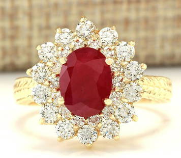 3.16 CTW Natural Ruby And Diamond Ring In 18K Yellow Gold: 3.16 CTW Natural Ruby And Diamond Ring In 18K Yellow Gold Manufacturer's Suggested Retail Price: $ 4500.00 Stamped: 18K Ring Size: 7 Total Ring Weight: 5.2 Grams Diamond Weight: Total