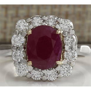 3.47 CTW Natural Ruby And Diamond Ring 14K Solid White Gold: 3.47 CTW Natural Ruby And Diamond Ring 14K Solid White Gold Manufacturer's Suggested Retail Price: $ 3400.00 Stamped: 14K Ring Size: 6.25 Total Ring Weight: 6.5 Grams Diamond Weight: 