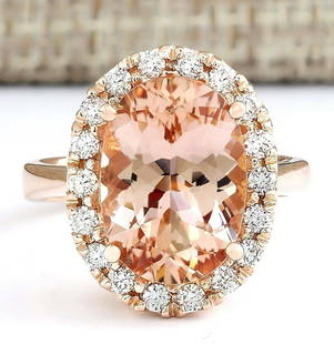 5.97 CTW Natural Morganite And Diamond Ring In 18K Rose Gold: 5.97 CTW Natural Morganite And Diamond Ring In 18K Rose Gold Manufacturer's Suggested Retail Price: $ 4000.00 Stamped: 18K Ring Size: 6.75 Total Ring Weight: 6.8 Grams Diamond Weight: 