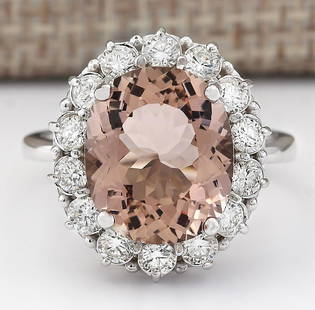 7.04 CTW Natural Morganite And Diamond Ring In 14k White Gold: 7.04 CTW Natural Morganite And Diamond Ring In 14k White Gold Manufacturer's Suggested Retail Price: $ 4600.00 Stamped: 14K Ring Size: 7.25 Total Ring Weight: 5.8 Grams Diamond Weight: 