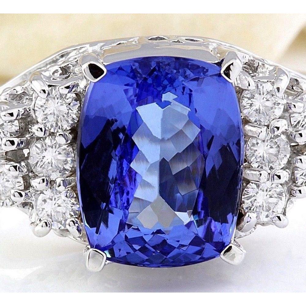 3.40 CTW Natural Tanzanite 18K Solid White Gold Diamond Ring: 3.40 CTW Natural Tanzanite 18K Solid White Gold Diamond Ring Manufacturer's Suggested Retail Price: $ 4100.00 3.40 Carat Natural Tanzanite 18K Solid White Gold Diamond Ring Item Type: Ring Item Style: