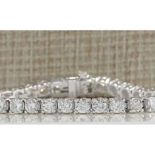 10.00 CTW Natural Diamond Bracelet In 18K Solid White Gold: 10.00 CTW Natural Diamond Bracelet In 18K Solid White Gold Manufacturer's Suggested Retail Price: $ 37600.00 Stamped: 18K Bracelet Width: 4.65mm Bracelet Length: 7.0 Inches Total