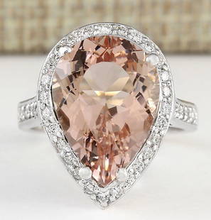 9.83 CTW Natural Morganite And Diamond Ring In 18K White Gold: 9.83 CTW Natural Morganite And Diamond Ring In 18K White Gold Manufacturer's Suggested Retail Price: $ 5800.00 Stamped: 18K Ring Size: 7.75 Total Ring Weight: 9.7 Grams Diamond Weight: 