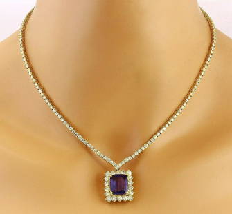 22.92 CTW Natural Tanzanite 14K Solid Yellow Gold Diamond Necklace: 22.92 CTW Natural Tanzanite 14K Solid Yellow Gold Diamond Necklace Manufacturer's Suggested Retail Price: $ 28100.00 22.92 Carat Natural Tanzanite 14K Solid Yellow Gold Diamond Necklace Item