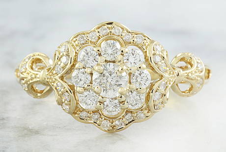 0.42 CTW Diamond 14K Yellow Gold Ring: 0.42 CTW Diamond 14K Yellow Gold Ring Manufacturer's Suggested Retail Price: $ 2300.00 Stamped: 14K Total Ring Weight: 2.9 Grams Diamond Weight 0.42 Carat ( F-G Color, VS2-SI1 Clarity ) Face