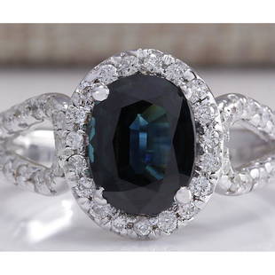 2.91 CTW Natural Blue Sapphire And Diamond Ring 18K Solid White Gold: 2.91 CTW Natural Blue Sapphire And Diamond Ring 18K Solid White Gold Manufacturer's Suggested Retail Price: $ 4000.00 Stamped: 18K Ring Size: 6.75 Total Ring Weight: 6 Grams Diamond Weight: 