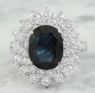 4.97 CTW Sapphire 14K White Gold Siamond Ring: 4.97 CTW Sapphire 14K White Gold Siamond Ring Manufacturer's Suggested Retail Price: $ 5800.00 Stamped: 14K Total Ring Weight: 6.3 Grams Rubelite Weight 2.76 Carat (10.00x8.00 Millimeters)