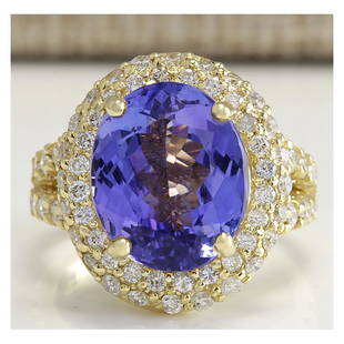 8.54 CTW Natural Tanzanite And Diamond Ring In 14K Yellow Gold: 8.54 CTW Natural Tanzanite And Diamond Ring In 14K Yellow Gold Manufacturer's Suggested Retail Price: $ 8000.00 Stamped: 14K Ring Size: 6.75 Total Ring Weight: 11.5 Grams Diamond Weight: 