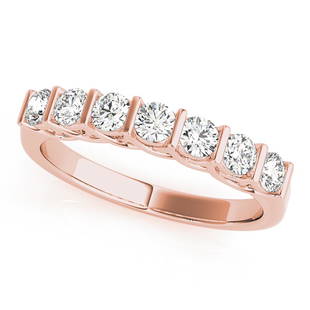 Natural 0.56 CTW Diamond Ring 18K Rose Gold: Natural 0.56 CTW Diamond Ring 18K Rose Gold Manufacturer's Suggested Retail Price: $ 2400.00 Product Type: Diamond Ring Stone1 Type: 7 Diamond @ 0.56 CTW Stone1 Color: G Stone1 Clarity: VS2-SI1