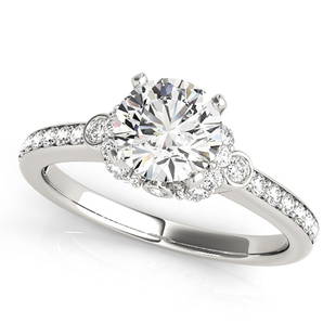 Natural 1.29 CTW Diamond Engagement Ring 14K White Gold: Natural 1.29 CTW Diamond Engagement Ring 14K White Gold Manufacturer's Suggested Retail Price: $ 14900.00 Product Type: Engagement Ring Stone1 Type: 1 Diamond @ 0.95 CTW Stone1 Color: G Stone1